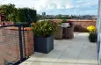 Luxe tegelvloer leggen op groot dakterras in Voorburg